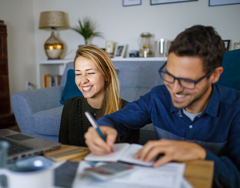 husband and wife laughing together