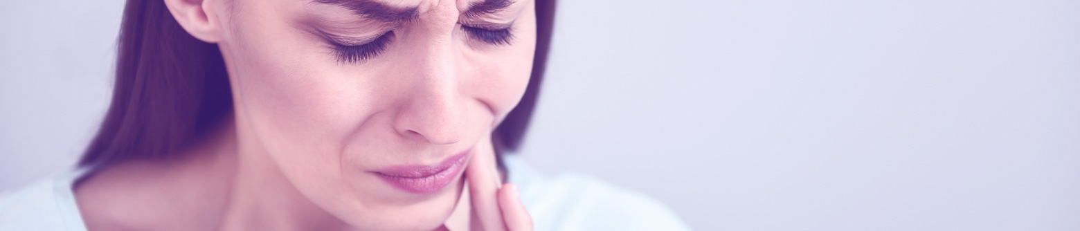 Woman with tooth pain