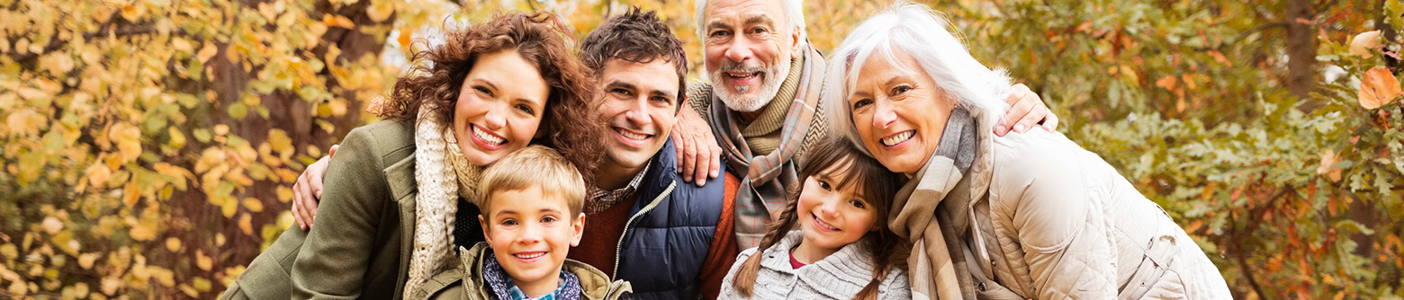 multigenerational family outside smiling together