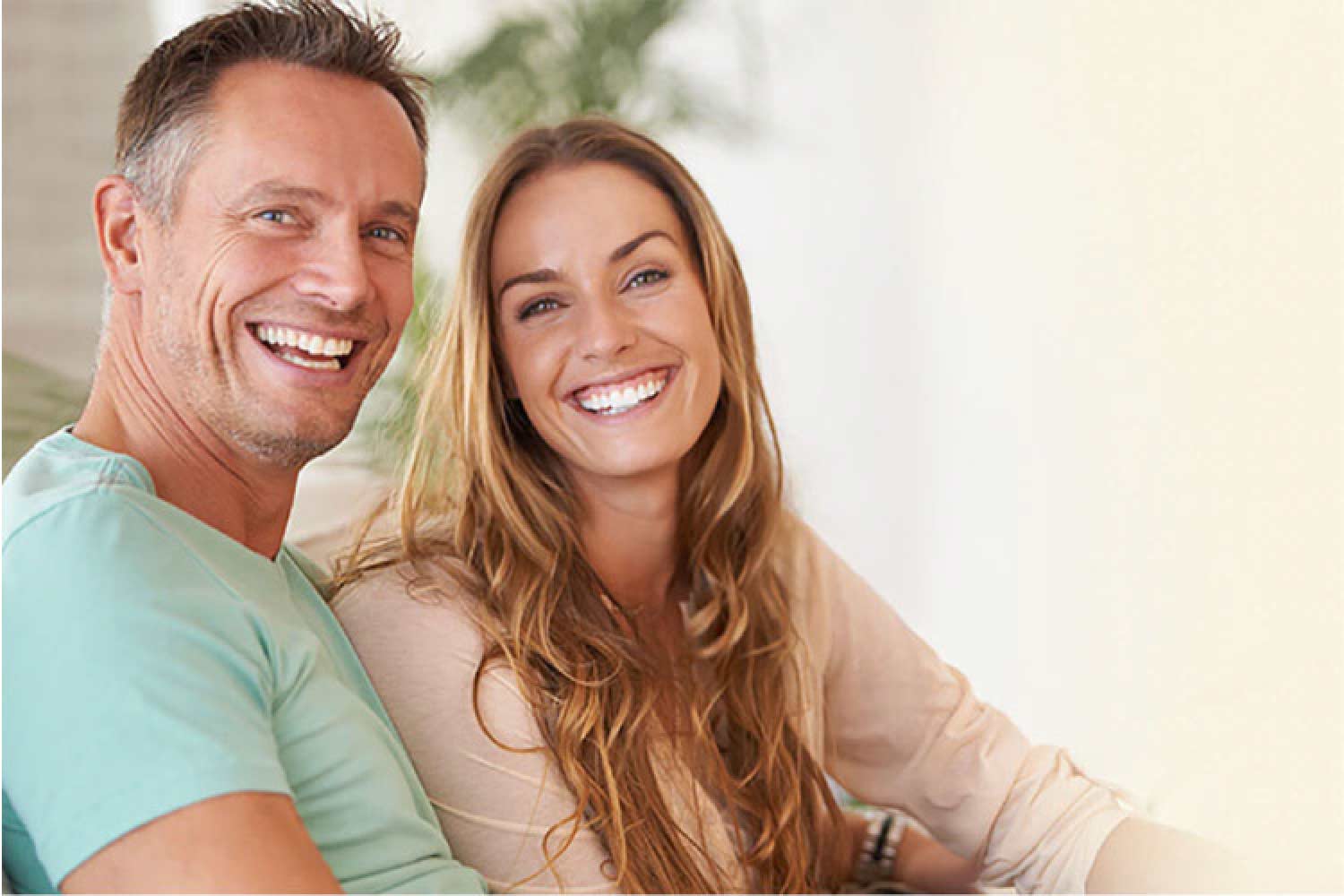 couple smile showing off tooth bonding results