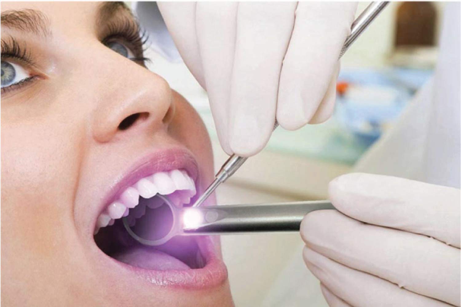 woman undergoing an oral cancer screening
