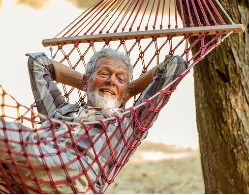 senior man in hammock